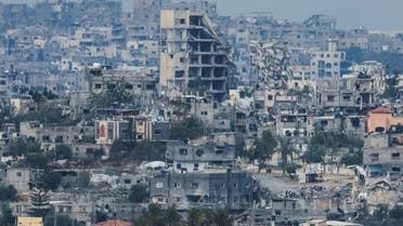 View of destroyed buildings in Gaza hit in Israeli strikes during the conflict, amid the temporary truce between Hamas and Israel, as seen from southern Israel, November 28, 2023. (Reuters)