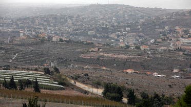 This picture taken from Kibbutz Manara in northern Israel on November 27, 2023, shows the southern Lebanon village of Hula. (AFP)