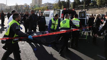 Israeli officials work at the scene of a violent incident in Jerusalem November 30, 2023 REUTERS/Ronen Zvulun