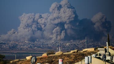 This picture taken from southern Israel near the border with the Gaza Strip shows smoke rising from buildings still after being hit by Israeli strikes, on December 1, 2023. (AFP)