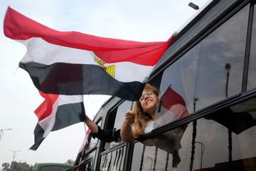 من مسيرة بالسيارات بأحد شوارع القاهرة بمناسبة الانتخابات المصرية - أسوشييتد برس