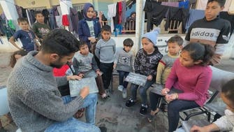 English teacher brings class to displaced students in Gaza