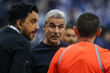 Al-Nassr’s Portuguese coach Luis Castro (C) argues with a referee during the Saudi Pro League football match between Al-Hilal and Al-Nassr at the King Fahd International Stadium in Riyadh on December 1, 2023. (AFP)