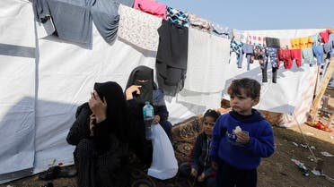 Displaced Palestinians stay outside their tent where they take shelter, as the conflict between Israel and Hamas continues, at Al-Nasser hospital in Khan Younis, in the southern Gaza Strip December 2, 2023. (Reuters)
