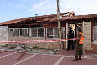 Israeli security forces inspect a synagogue after it was hit following a rocket attack from the Gaza Strip, in Sderot, near the southern Israeli border with Gaza, on December 3, 2023, after battles resumed between Israel and Hamas militants. (AFP)