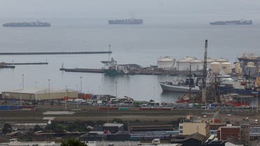 Container ships are seen outside the harbour as workers at South Africa's state-owned logistics firm Transnet continue to protest outside the Port of Cape Town on their nationwide strike action that could paralyse ports and freight rail services in Cape Town, South Africa, October 17, 2022. (Reuters)