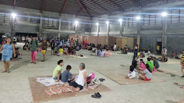 People gather at an evacuation center, in the aftermath of an earthquake, in Hinatuan, Surigao del Sur, Philippines December 2, 2023. (Reuters)
