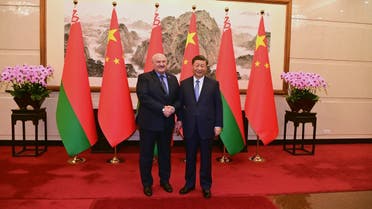 This handout picture taken and released by the Belarusian presidential press service on December 4, 2023 shows Belarus' President Alexander Lukashenko meeting with Chinese President Xi Jinping in Beijing. (Photo by Handout / Belarusian presidential press service / AFP)