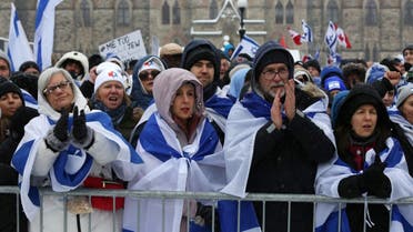 Demonstrators gather in support of the Jewish community, on Parliament Hill in Ottawa, Ontario, Canada, on December 4, 2023. (AFP)