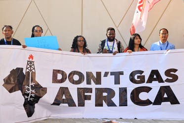 Participants protest during the COP28 United Nations climate summit in Dubai on December 5, 2023. (AFP)