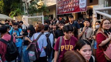 Students evacuate following an earthquake, in Manila, Philippines, on December 5, 2023. (Reuters)