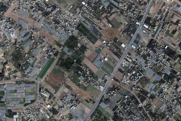 In this satellite image from Planet Labs PBC, Israeli armored vehicles and tanks can be seen just north of Khan Younis in the Gaza Strip on December 3, 2023. (AP)