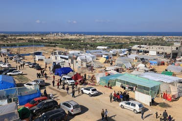 Displaced Palestinians who fled Khan Younis set up a camp in Rafah further south near the Gaza Strip’s border with Egypt, on December 6, 2023. (AFP)