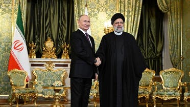 Russian President Vladimir Putin shakes hands with Iranian President Ebrahim Raisi during a meeting in Moscow, Russia December 7, 2023. (Reuters)