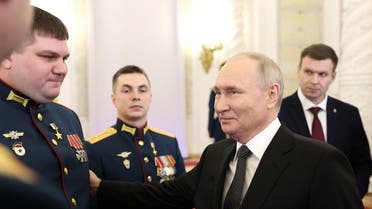 Russia's President Vladimir Putin attends a ceremony to present Gold Star medals to service members, bearing the title of Hero of Russia and involved in the country's military campaign in Ukraine, on the eve of Heroes of the Fatherland Day at the St. George Hall of the Grand Kremlin Palace in Moscow, Russia, December 8, 2023. Sputnik/Valeriy Sharifulin/Pool via REUTERS