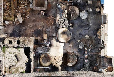 This handout picture released on December 8, 2023 by the Pompeii archaeological park, shows the Regio IX area of the site where a prison-bakery has been discovered, announced the archaeological park on the same day. (AFP)