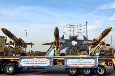 A handout picture provided by the Iranian Army office on December 10, 2023, shows Iranian homemade Karrar drones displayed during an inauguration ceremony in Tehran. (AFP)