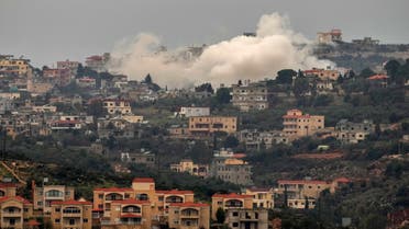 Smoke rises from Israeli artillery shelling on Aita al-Shaab, a Lebanese border village with Israel, in south Lebanon, Saturday, Dec. 9, 2023. (AP Photo/Hassan Ammar)