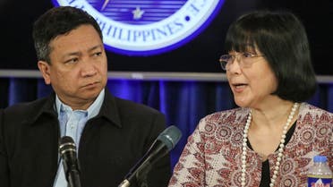 Department of Foreign Affairs spokesperson Maria Teresita Daza (R) talks while Jonathan Malaya (L), assistant Director General of the National Security Council, listens during a press conference about recent confrontations between Chinese and Philippine vessels in Scarborough Shoal and Second Thomas Shoal in the disputed South China Sea, in Manila on December 11, 2023. (AFP)