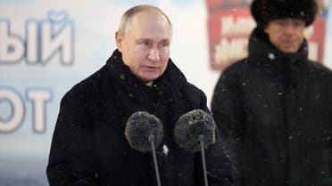 Russian President Vladimir Putin attends a flag-raising ceremony for two nuclear-powered submarines in the northern city of Severodvinsk, Russia, December 11, 2023. (Pool via Reuters)