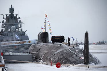 Sailors attend a flag-raising ceremony on the nuclear-powered submarine Emperor Alexander the Third at the naval base in the northern city of Severodvinsk, Russia, December 11, 2023. (Kremlin via Reuters)