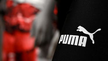 The logo of German sportswear maker Puma is seen on a pair of trousers in Herzogenaurach, southern Germany on March 1, 2023. (AFP)