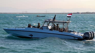 Yemeni coastguard members loyal to the internationally-recognised government ride in a patrol boat in the Red Sea off of the government-held town of Mokha in the western Taiz province, close to the strategic Bab al-Mandab Strait, on December 12, 2023. (Photo by Khaled ZIAD / AFP)