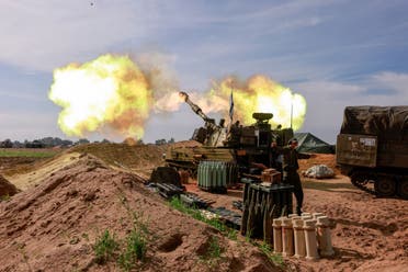 A picture taken in southern Israel near the border with the Gaza Strip on December 20, 2023, shows Israeli artillery firing towards Gaza amid continuing battles between Israel and the militant group Hamas. (AFP)