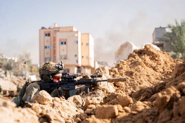 An Israeli soldier operates in the Gaza Strip amid the ongoing conflict between Israel and Hamas, in this handout picture released on December 21, 2023. (Reuters)