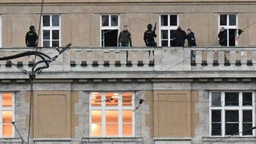 Armed police are seen on the balcony of the Charles University in central Prague, Czech Republic, Dec. 21, 2023. (AFP)
