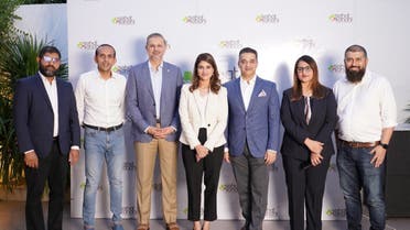 Officials from Pakistani startup Sehat Kahani and Amaanah Circle gesture for a group photo after the signing of $2.7 million in Series A funding in Karachi on December 21, 2023. (Photo courtesy: Sehat Kahani)
