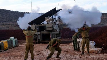 Israeli forces as an artillery unit in northern Israel fires toward southern Lebanon on November 22, 2023. (AFP)