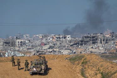 Israeli army troops are seen near the Gaza Strip border, in southern Israel, December 24, 2023. (AP)