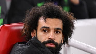 Liverpool’s Egyptian striker #11 Mohamed Salah reacts prior to the English League Cup quarter-final football match between Liverpool and West Ham United at Anfield in Liverpool, north west England, on December 20, 2023. (AFP)
