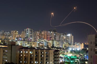 Israel's Iron Dome anti-missile system intercepts rockets launched from the Gaza Strip, amid the ongoing conflict between Israel and the Palestinian Islamist group Hamas, as seen from Ashkelon, Israel, December 25, 2023. (Reuters)