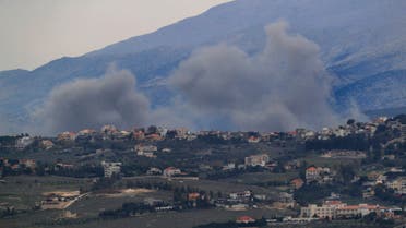 Smoke rises after Israeli air strikes on the outskirts of Khiam, a town near the Lebanese-Israeli border, seen from the town of Marjayoun, south Lebanon, Thursday, Dec. 21, 2023. Lebanon's militant Hezbollah group has been exchanging fire with Israeli troops along the tense frontier, which seen violent exchanges since Oct. 8 a day after the Palestinian militant Hamas group attacked southern Israel. (AP Photo/Mohammed Zaatari)