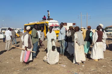 Displaced people fleeing from al-Jazirah state arrive in Gedaref in the east of war-torn Sudan on December 22, 2023. The brutal conflict broke out in mid-April 2023 between the army and the paramilitary Rapid Support Forces (RSF), killing more than 12,000 people and displacing millions. (AFP)