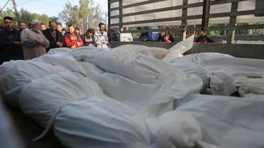غزہ میں  سفید کفن میں لپٹی لاشیں