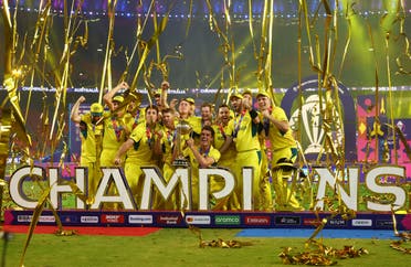 Australia players celebrate with the trophy after winning the ICC Cricket World Cup at the Narendra Modi Stadium, Ahmedabad, India on November 19, 2023. (Reuters)