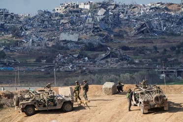 Israeli soldiers take up positions near the Gaza Strip border, in southern Israel, December 29, 2023. (AP)