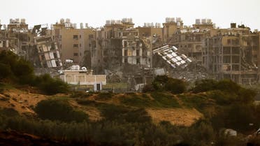 A picture taken from a position in southern Israel on the border with the Gaza Strip on January 2, 2024, shows destroyed buildings in northern Gaza following Israeli bombardment amid ongoing battles between Israel and Hamas. (AFP)