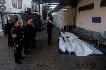 Mourners pray next to the bodies of Palestinians killed in an Israeli strike, amid the ongoing conflict between Israel and Hamas, at Abu Yousef Al Najjar hospital, in Rafah, in the southern Gaza Strip, on January 5, 2024. (Reuters)
