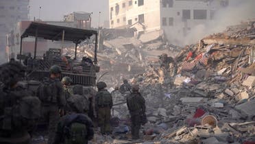 Israeli soldiers operate in a location given as Gaza, amid the ongoing conflict between Israel and Hamas, in this screengrab from a handout video released on January 4, 2024. (Reuters)