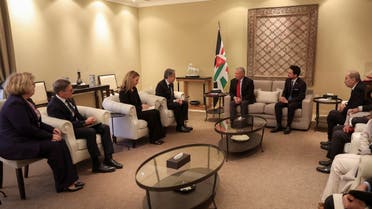 Jordan’s King Abdullah II and Crown Prince Hussein meet with US Secretary of State Antony Blinken and officials in Amman, Jordan, in this handout picture released on January 7, 2024. (Reuters)