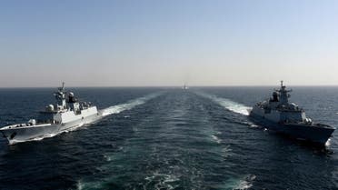 Pakistan Navy Ship (PNS) Taimur (L) and Tughril (R) take part during the multinational naval exercise 'AMAN-23' in the Arabian Sea near Pakistan's port city of Karachi on February 13, 2023. (AFP/File)