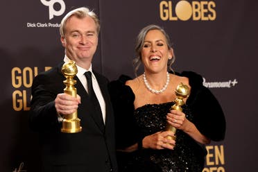 Christopher Nolan and Emma Thomas pose with the awards for Best Director and Best Mo-tion Picture - Drama for ‘Oppenheimer’ at the 81st Annual Golden Globe Awards in Beverly Hills, California, US, on January 7, 2024. (Reuters)
