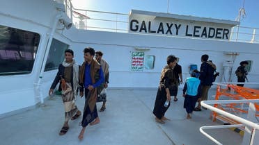 People tour the deck of the Galaxy Leader commercial ship, seized by Yemen's Houthis last month, off the coast of al-Salif, Yemen December 5, 2023. REUTERS/Khaled Abdullah
