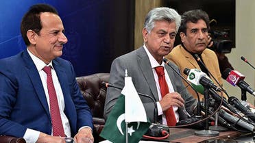 Pakistan's caretaker information minister, Murtaza Solangi (center), speaks during a press briefing in Islamabad on January 9, 2024. (APP)