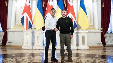 Ukrainian President Volodymyr Zelenskyy shakes hands with Britain’s Prime Minister Rishi Sunak (L) during a meeting at the Presidential Palace in Kyiv on January 12, 2024. (AFP)