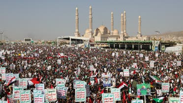 Supporters of the Houthis rally to denounce air strikes launched by the US and Britain on Houthi targets, in Sanaa, Yemen January 12, 2024. (Reuters)